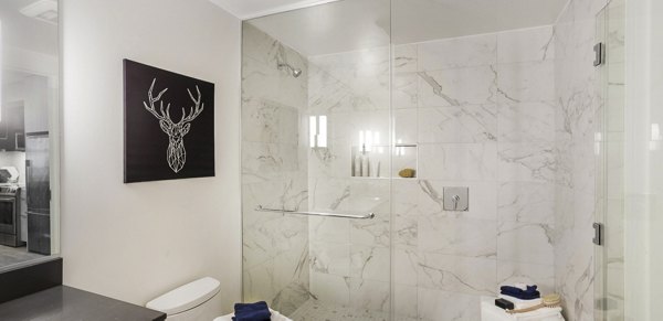 Bathroom featuring modern fixtures at 33 8th St Apartments, luxury living by Greystar in an upscale urban setting