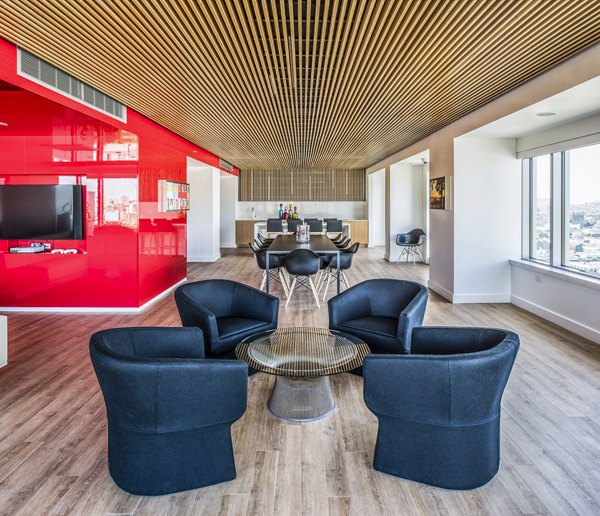 Elegant clubhouse with modern decor at 33 8th St Apartments, offering luxury amenities and community spaces for residents