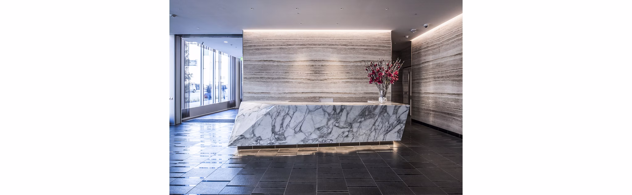 Elegant clubhouse lobby with modern seating and stylish decor at 33 8th St Apartments in luxury setting