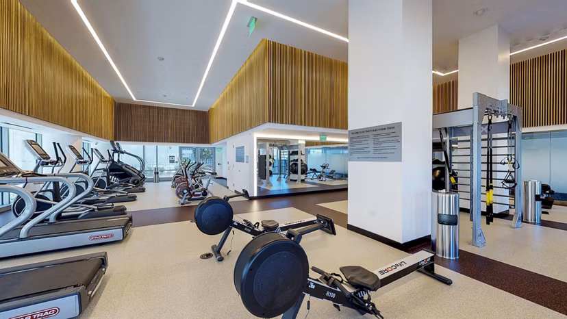Modern fitness center with cutting-edge equipment at 33 8th Street Apartments, ideal for luxury living and active lifestyle enthusiasts