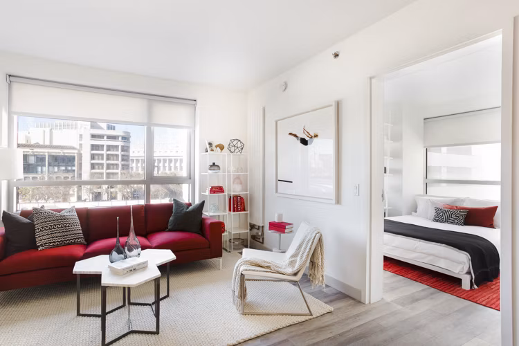 Spacious living room with modern decor at 33 8th St Apartments, offering a comfortable and stylish space for relaxation and entertainment
