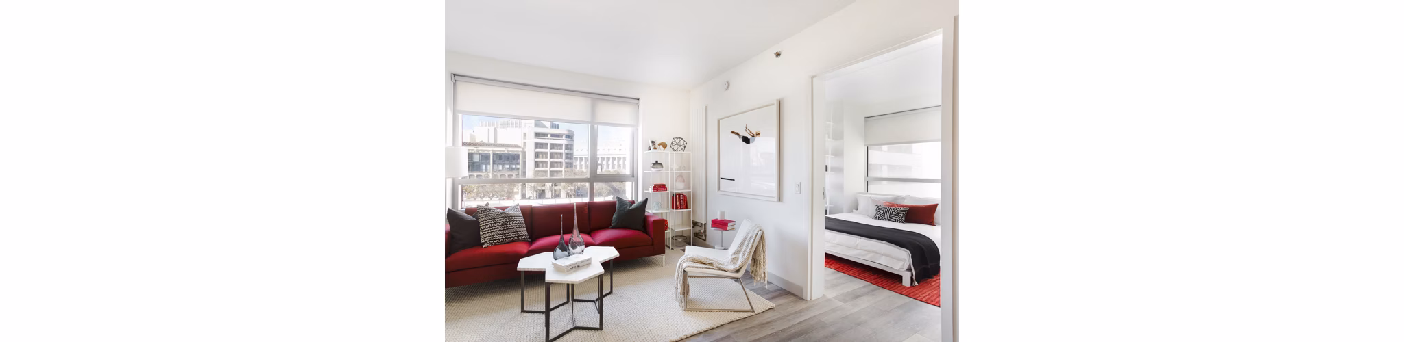 Spacious living room with modern decor at 33 8th St Apartments, offering a comfortable and stylish space for relaxation and entertainment