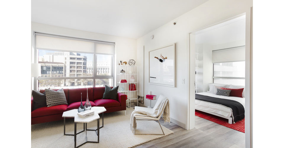 Spacious living room with modern decor at 33 8th St Apartments, offering a comfortable and stylish space for relaxation and entertainment