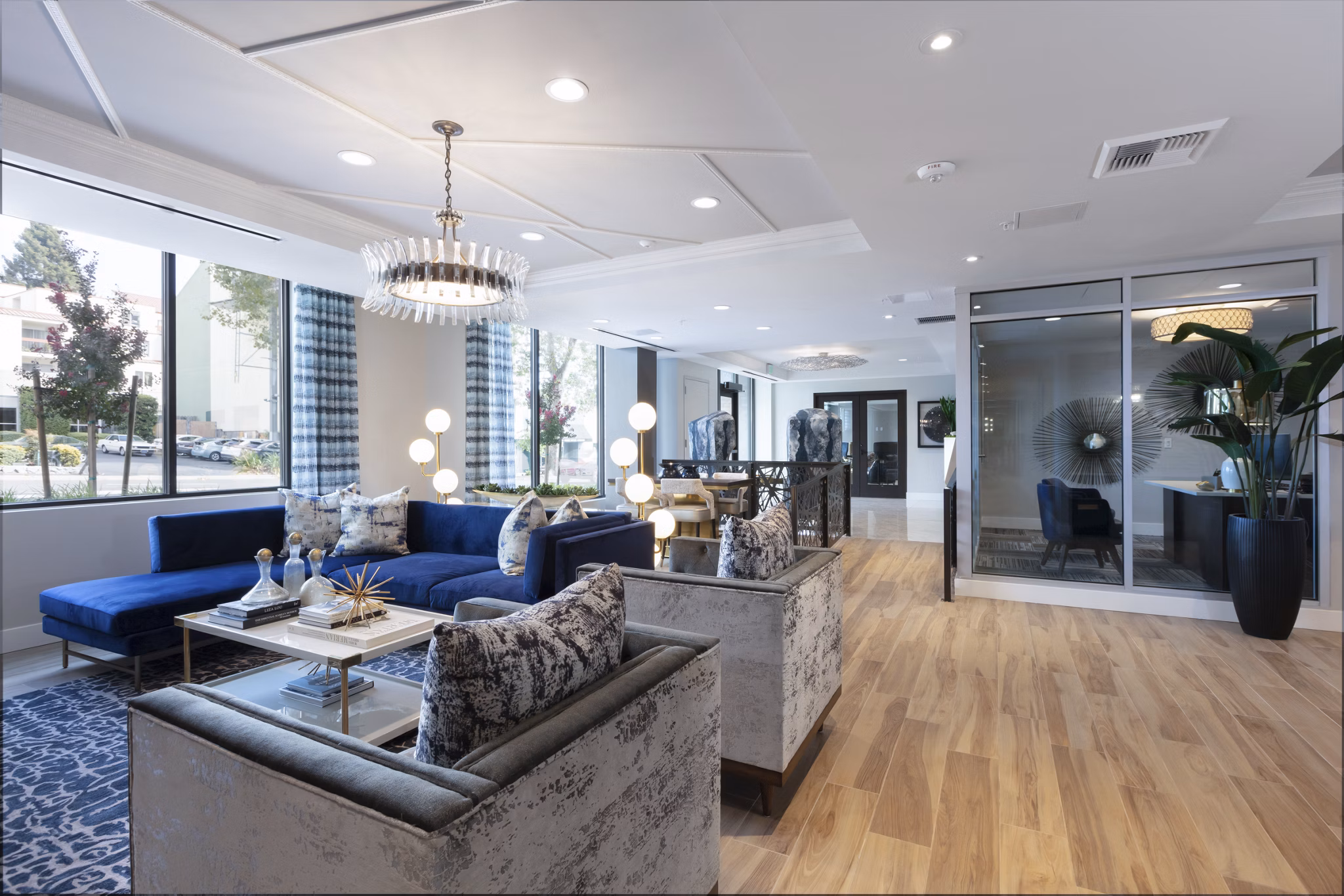 Baxter on Broadway: Stylish clubhouse interior with modern decor perfect for resident gatherings at luxury Oakland apartments