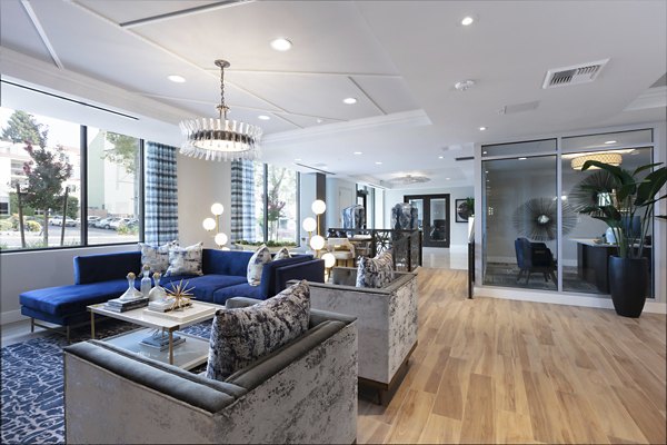 Baxter on Broadway: Stylish clubhouse interior with modern decor perfect for resident gatherings at luxury Oakland apartments