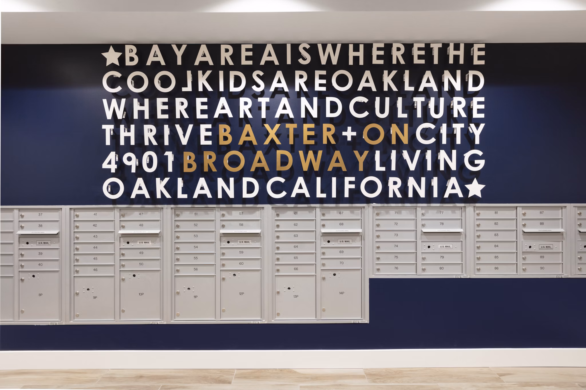 Mail room with secure parcel lockers at Baxter on Broadway Apartments