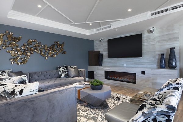 Clubhouse with modern furnishings at Baxter on Broadway Apartments for luxury living