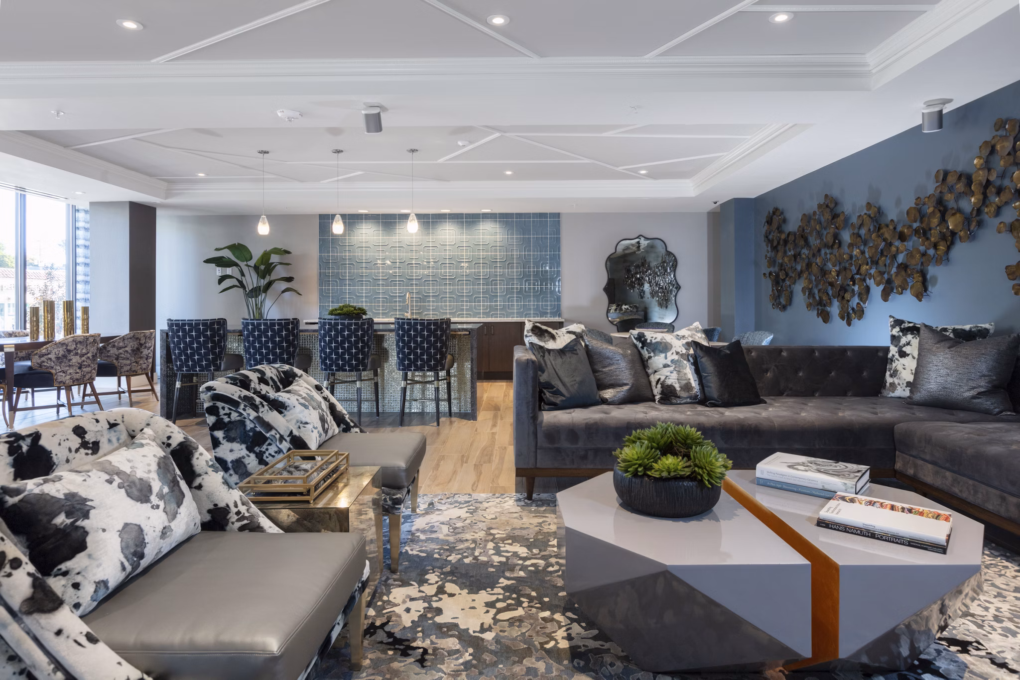 Clubhouse featuring modern design and cozy seating at Baxter on Broadway Apartments, a Greystar luxury property in vibrant Oakland