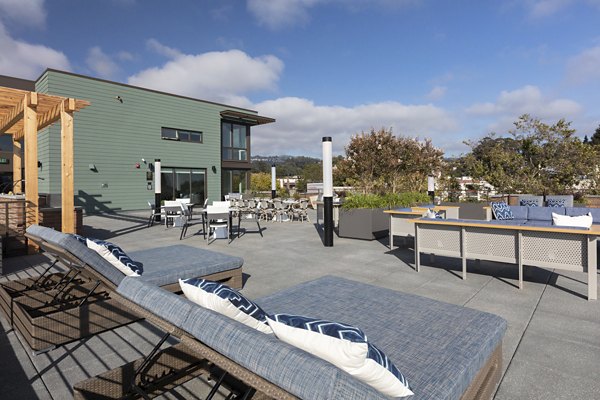 Rooftop deck with city views at Baxter on Broadway Apartments for luxurious urban living