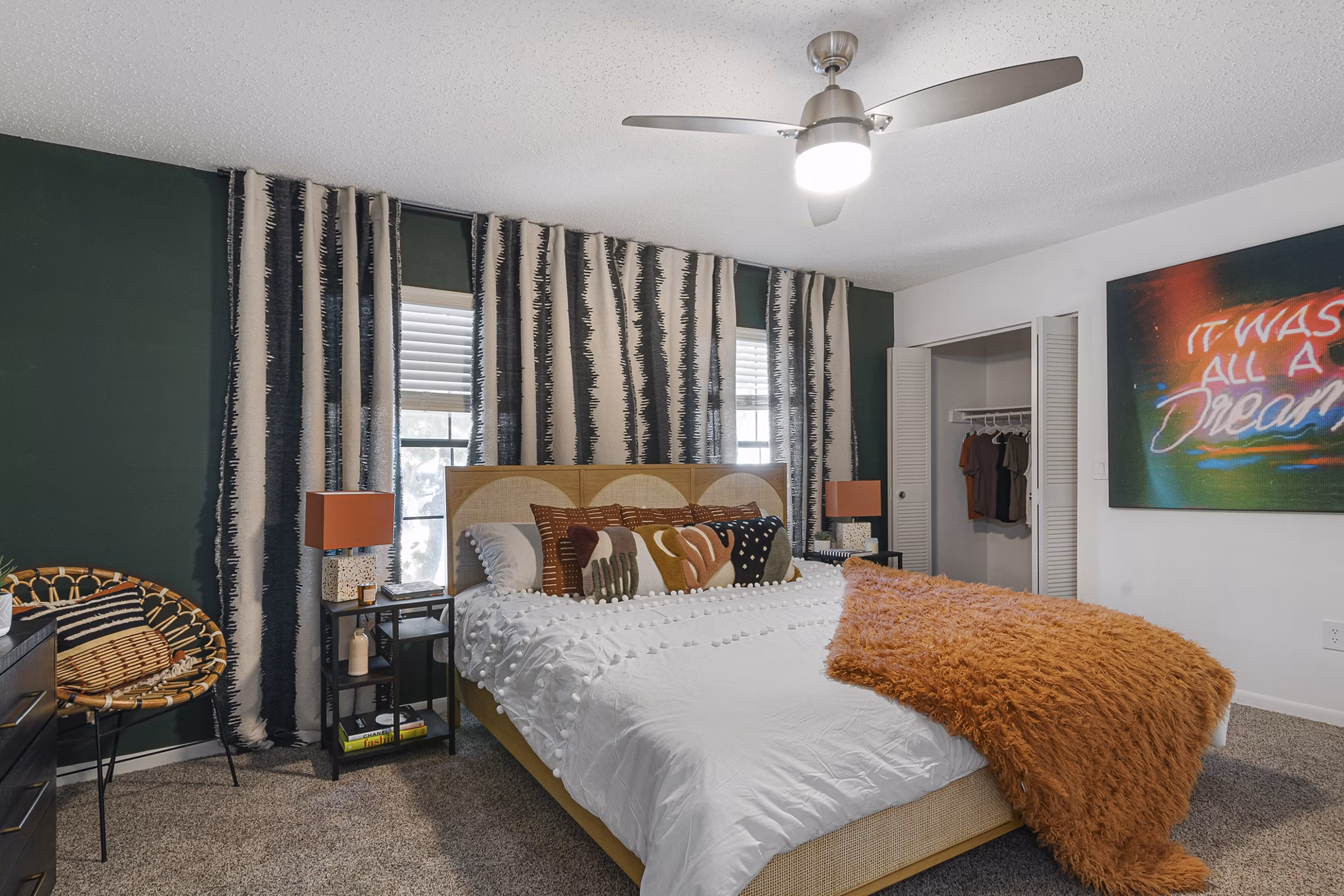 Cozy bedroom with modern decor and ample natural light at Aventura Bellevue Apartments