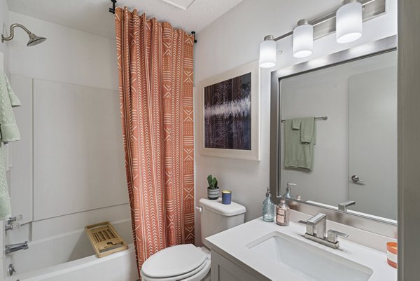 Luxurious bathroom featuring modern fixtures at Aventura Bellevue Apartments with sleek design and elegant lighting