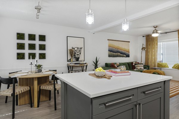 Modern kitchen with stainless steel appliances in Aventura Bellevue Apartments