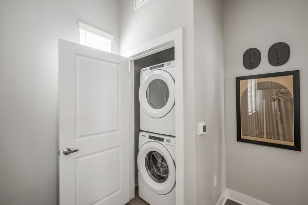 laundry room at Wingspan at Bridgeland Apartments