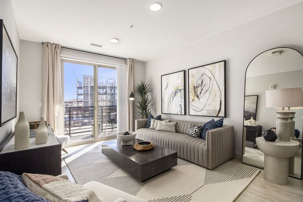 Living room featuring elegant furnishings at AVRA at RidgeGate Station Apartments