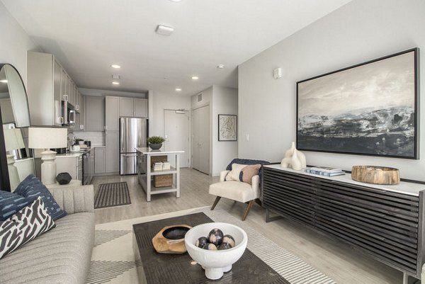 Modern living room with chic furnishings at AVRA at RidgeGate Station Apartments