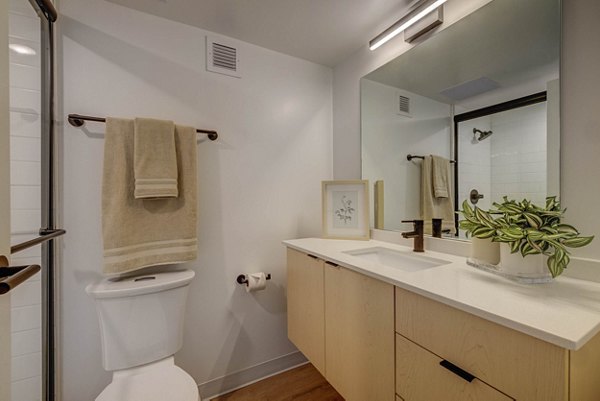 Modern bathroom with sleek fixtures at Lattice Apartments, offering luxury living in a prime location