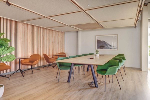 Meeting space featuring modern furnishings at Lattice Apartments, perfect for productive gatherings