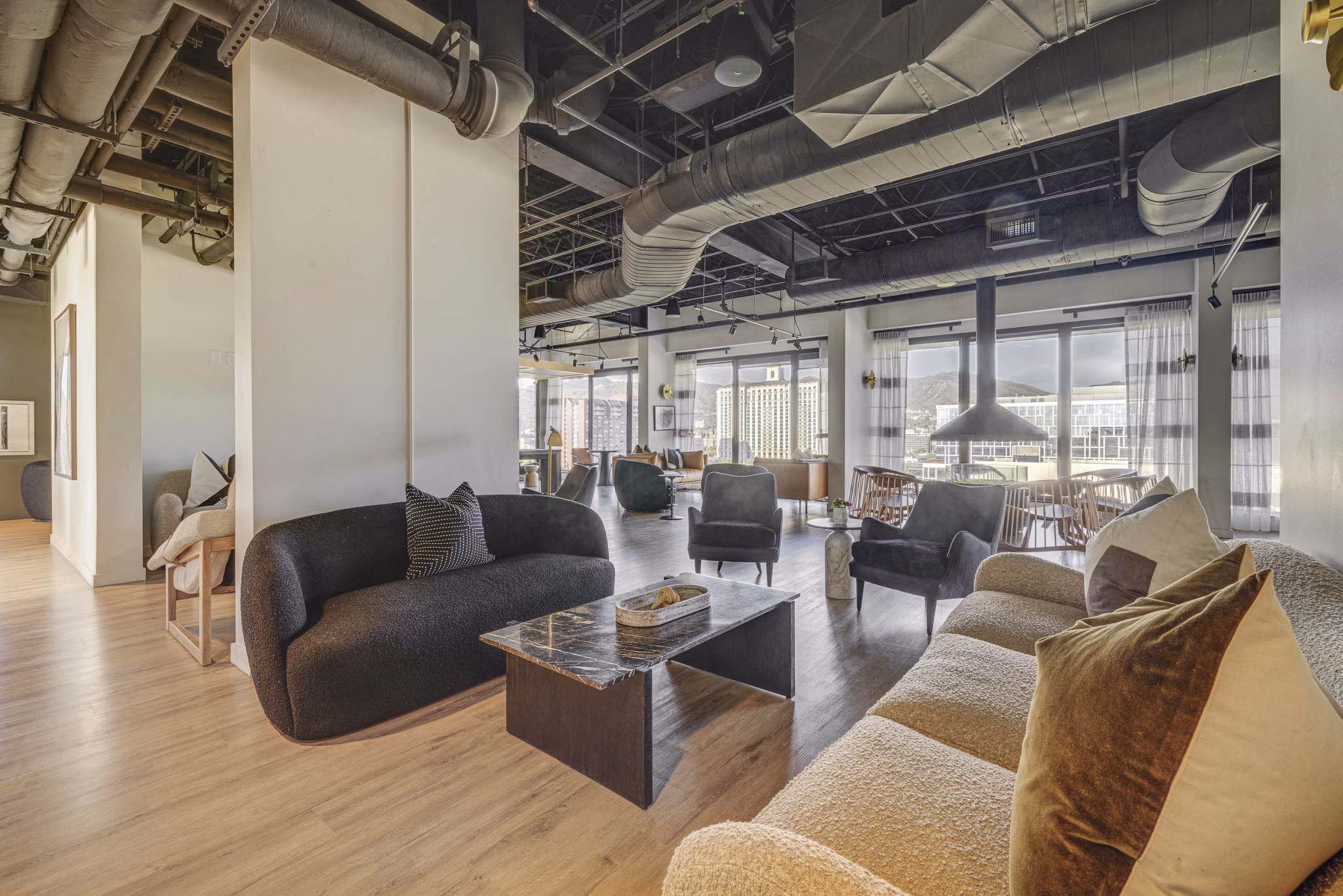 Clubhouse featuring modern design elements at Lattice Apartments: a luxury community offering premium amenities and social spaces