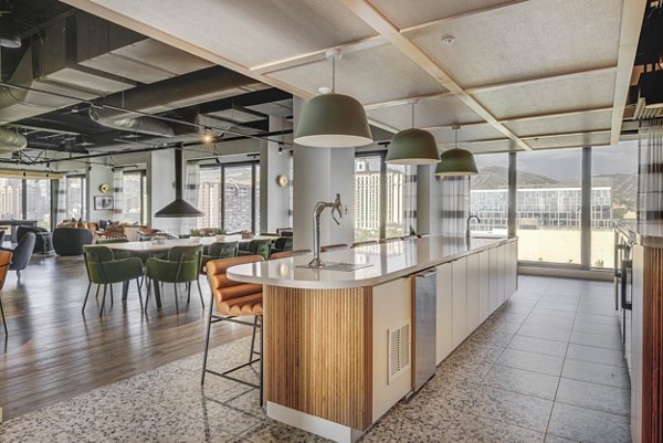 Clubhouse with modern furnishings and entertainment options at Lattice Apartments' luxury community