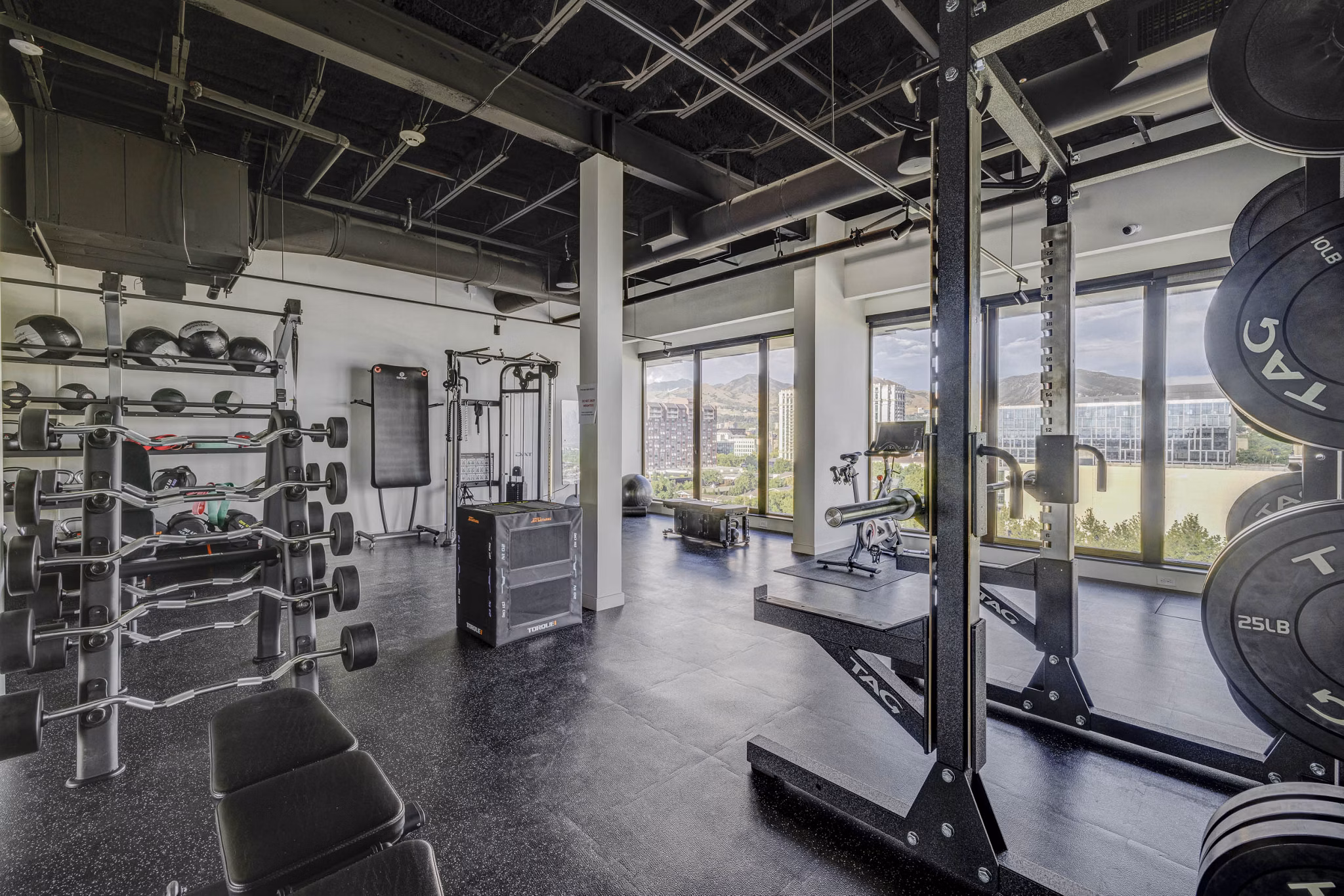 State-of-the-art fitness center with modern equipment at Lattice Apartments luxury community