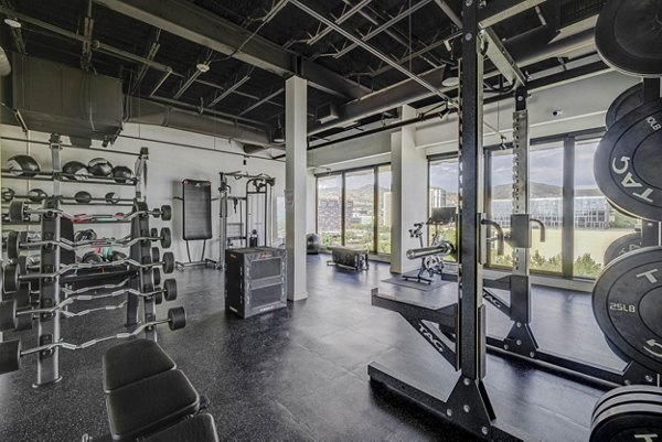 State-of-the-art fitness center with modern equipment at Lattice Apartments luxury community