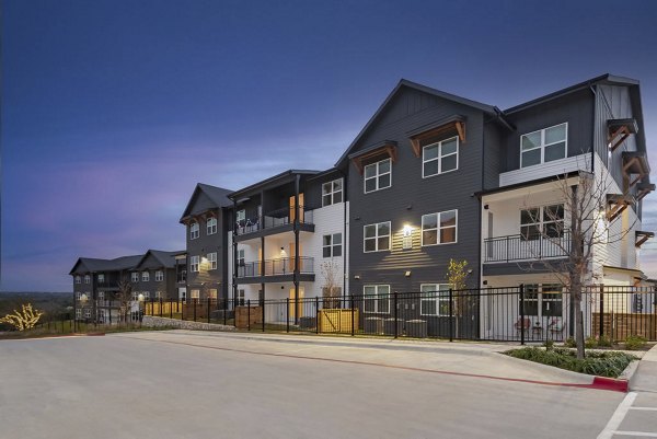 building/exterior at Citizen House Wolf Ranch Apartments