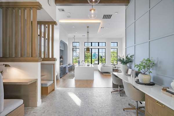 Modern clubhouse with lounge seating and billiards at Citizen House Bergstrom luxury apartments