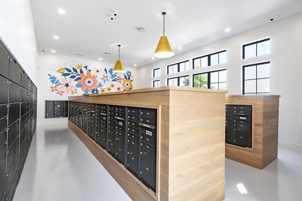 Mail room with secure package lockers at Citizen House Bergstrom Apartments