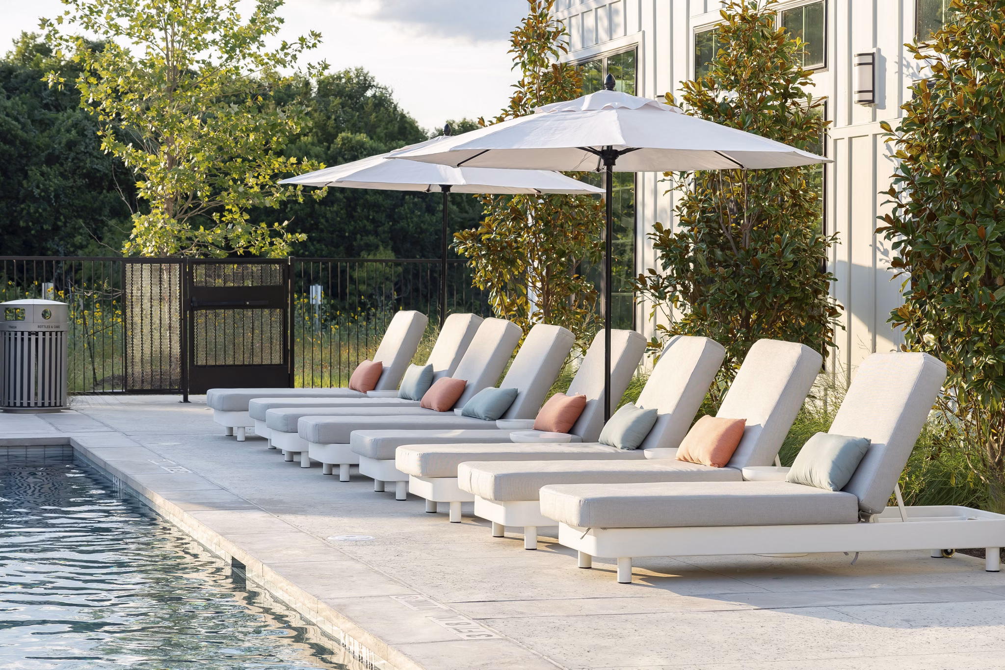 Infinity pool with stunning cityscape views at Citizen House Bergstrom Apartments, a Greystar luxury community in vibrant Austin