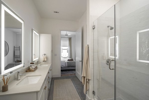 Modern bathroom with sleek fixtures at Solomon Apartments: Greystar's luxury living in Bellevue