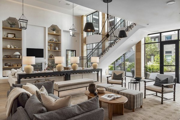 Luxe lobby with modern furnishings and chic lighting at Solomon Apartments