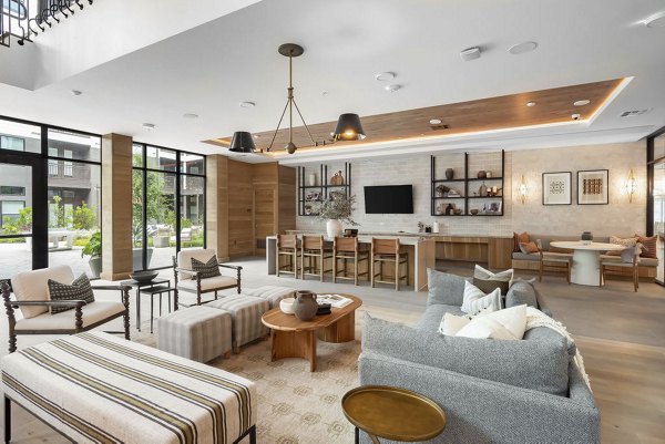 Luxurious lobby featuring modern seating and artwork at Solomon Apartments