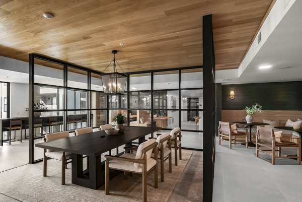 Elegant dining room with modern furniture at Solomon Apartments