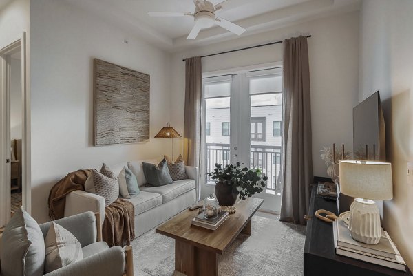 Modern living room with stylish furniture at Solomon Apartments