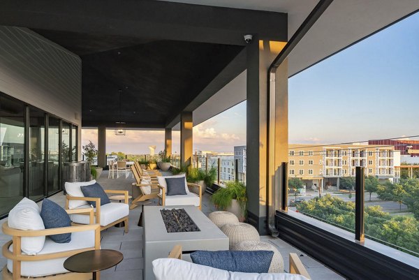 Private balcony overlooking city skyline at Solomon Apartments luxury residences