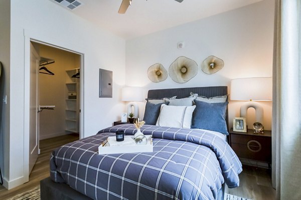 Cozy bedroom with contemporary design elements at Markana Uptown Apartments