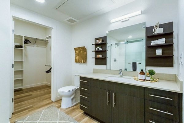Modern bathroom with sleek fixtures at Markana Uptown Apartments