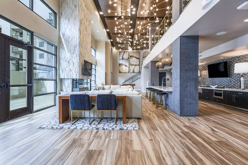 Elegant clubhouse with modern seating and lighting at Markana Uptown Apartments