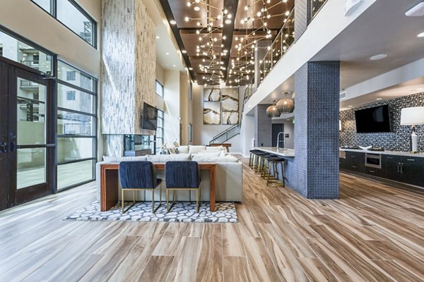 Elegant clubhouse with modern seating and lighting at Markana Uptown Apartments