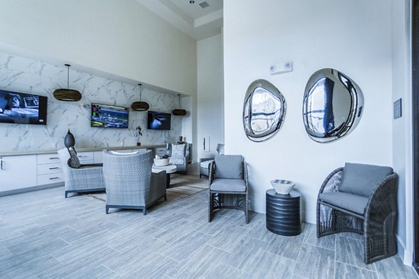 Elegant clubhouse featuring modern decor at Markana Uptown Apartments, ideal for gatherings and resident events