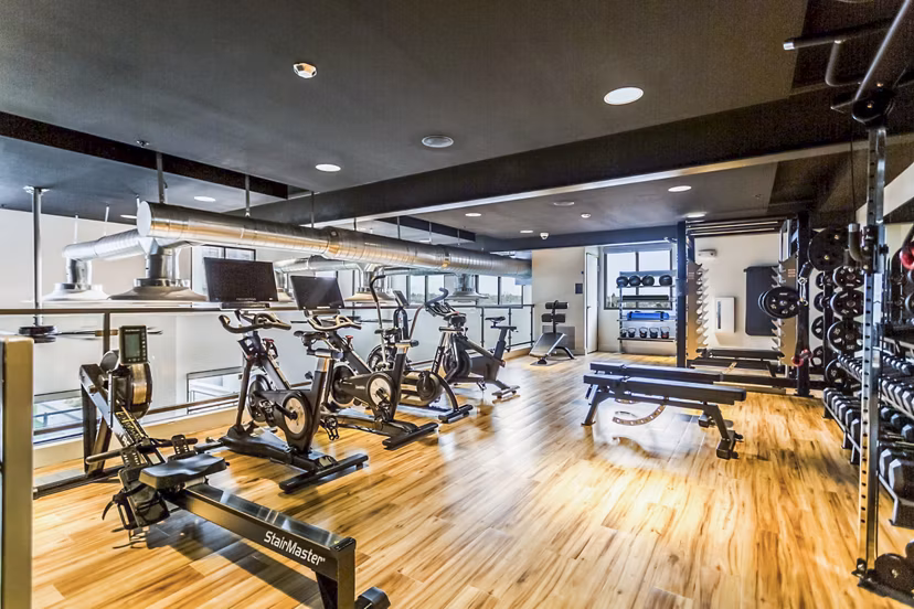 State-of-the-art fitness center with modern equipment at Markana Uptown Apartments