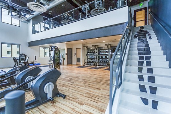 State-of-the-art fitness center at Markana Uptown Apartments featuring modern gym equipment for residents' wellness and active lifestyle
