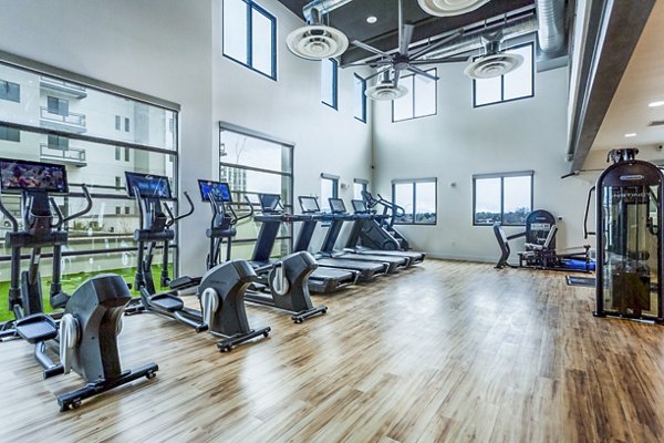 State-of-the-art fitness center with modern equipment at Markana Uptown Apartments for an active lifestyle