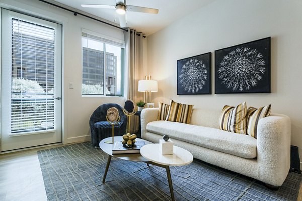 Modern living room with stylish furnishings at Markana Uptown Apartments