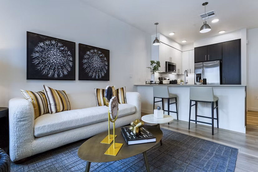 Modern living room with sleek furnishings at Markana Uptown Apartments, luxury apartment in vibrant urban setting