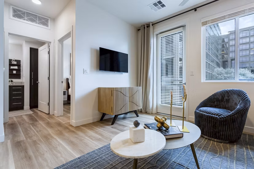 Spacious living room with modern decor in Markana Uptown Apartments