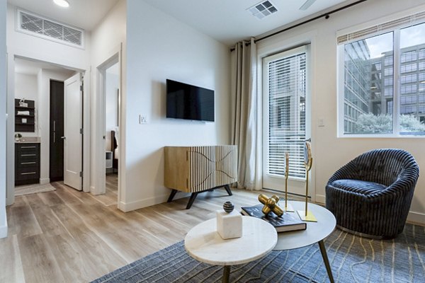 Spacious living room with modern decor in Markana Uptown Apartments