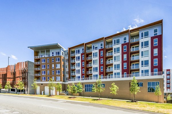 VY Reston Heights: Modern luxury apartment building in Reston, showcasing sleek architectural design