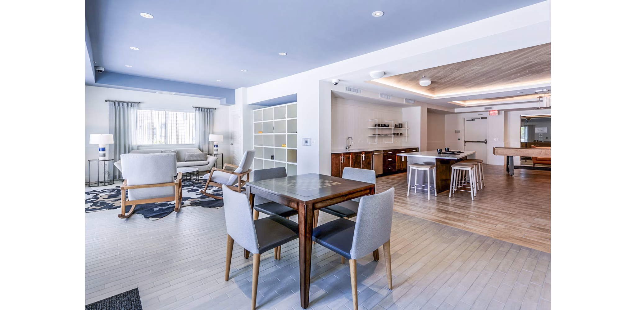 Modern clubhouse featuring stylish decor and open seating at VY Reston Heights Apartments