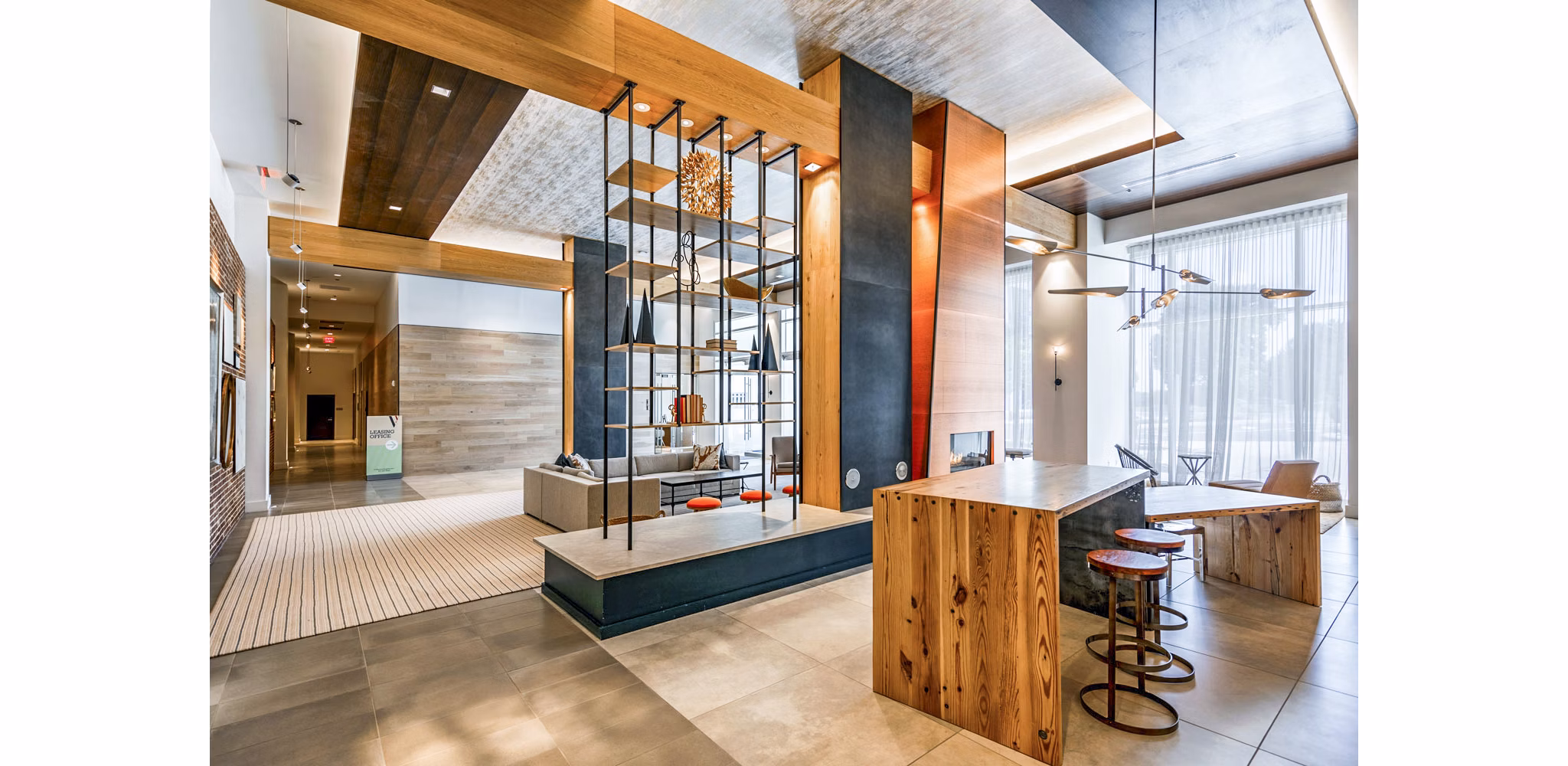 Clubhouse with modern decor and seating at VY Reston Heights Apartments, a luxury property in Reston